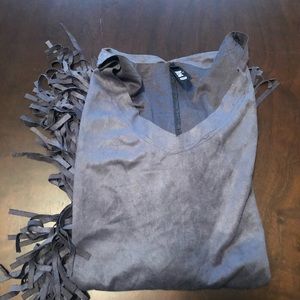 Diva D. Gray fringe shirt.
